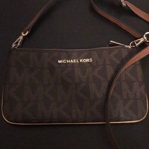 Michael Kors brown crossbody bag with MK pattern
